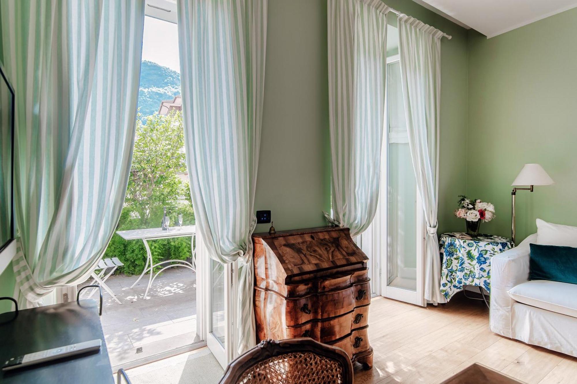 Green Home 65 - The House Of Travelers Côme Esterno foto